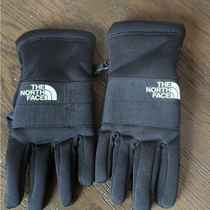 The North Face kids gloves. New without tags. Never worn. Size large - black.